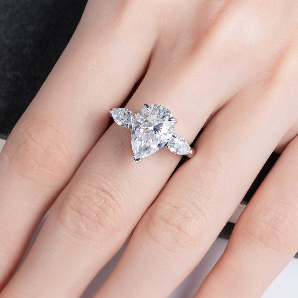 S925‑Silver Moissanite Pear‑Shape Three‑Stone Ring