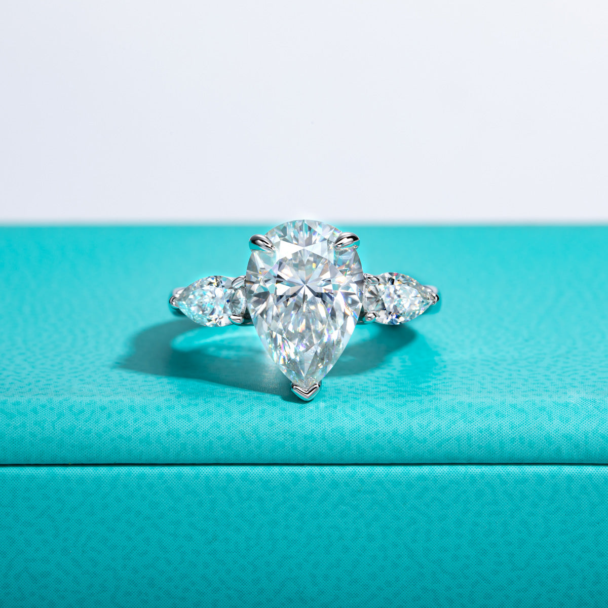 S925‑Silver Moissanite Pear‑Shape Three‑Stone Ring
