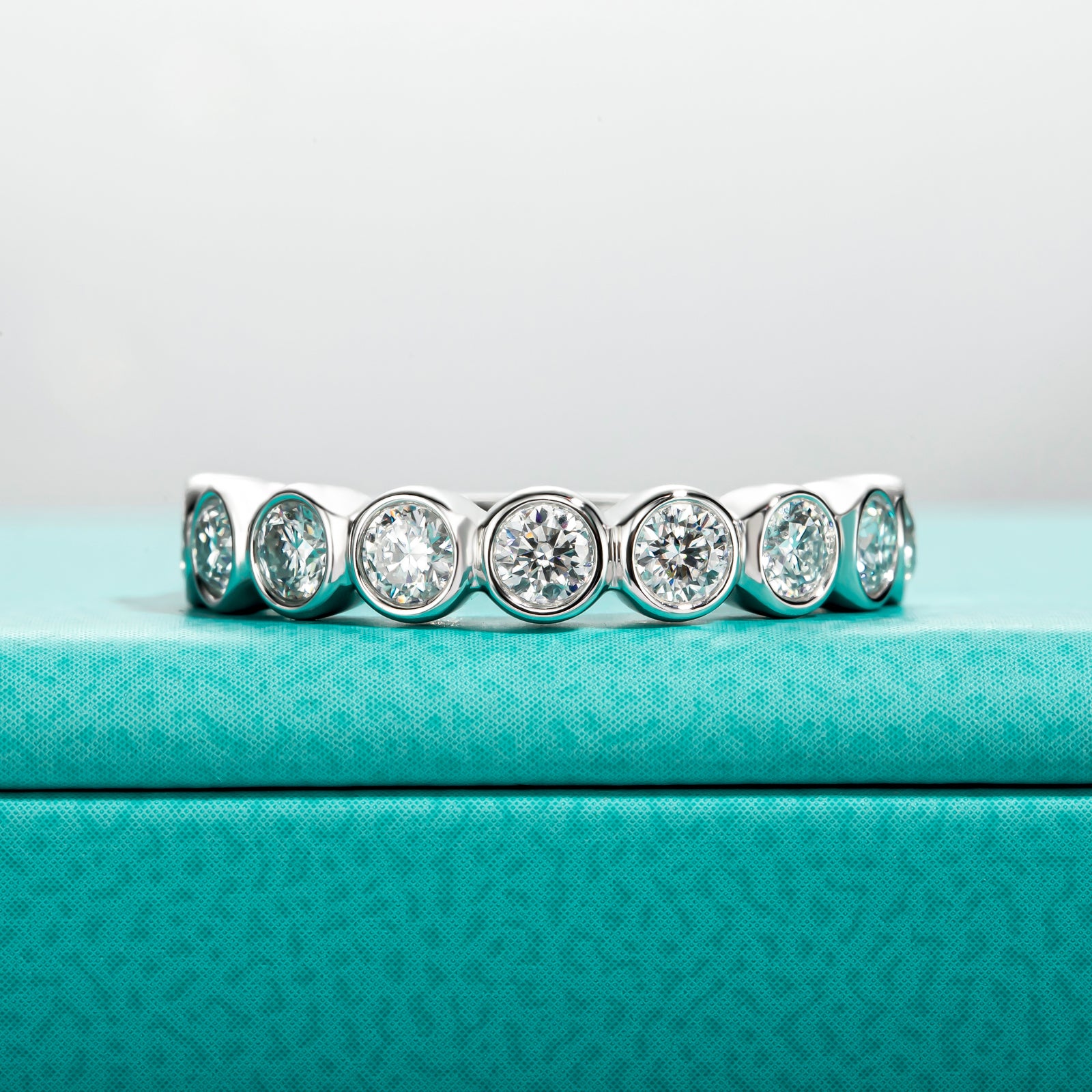 Round Cut 9 Stone Moissanite Wedding Band (0.9 cttw)