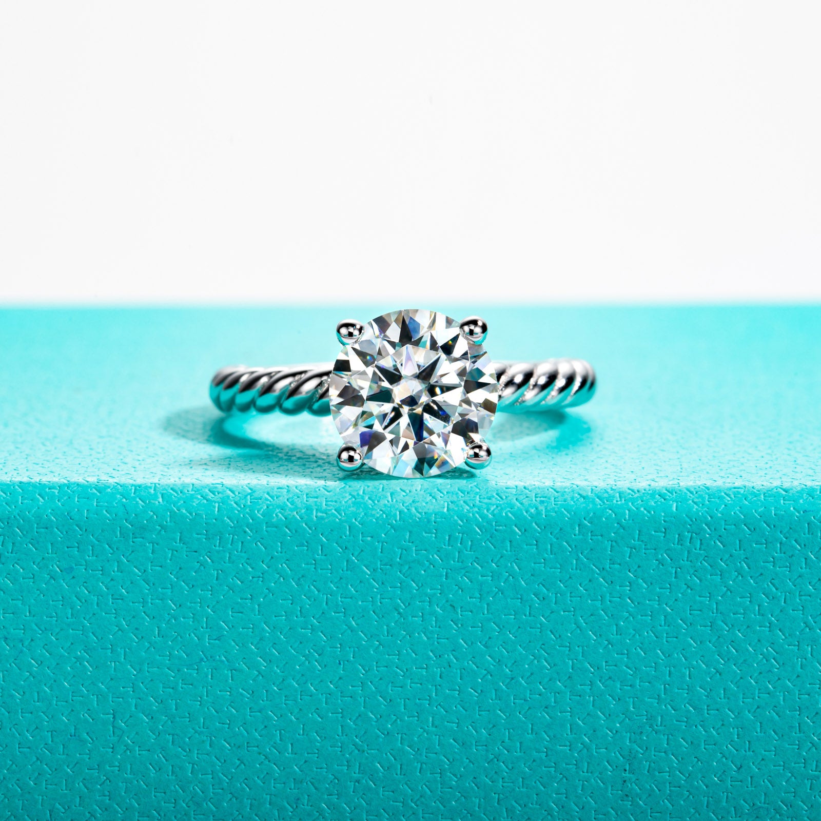 Round Cut Moissanite Twisted Engagement Ring (2/3 ct)